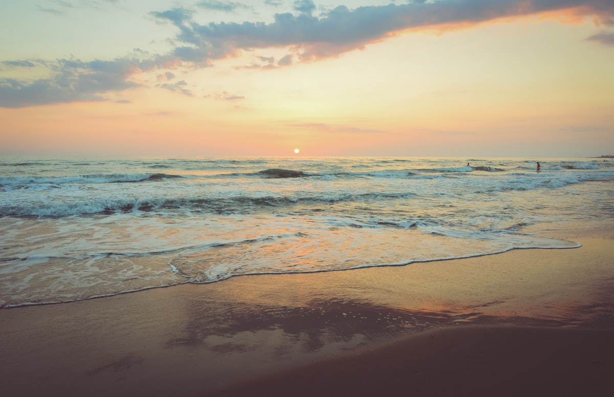 Sunset waves on the shore